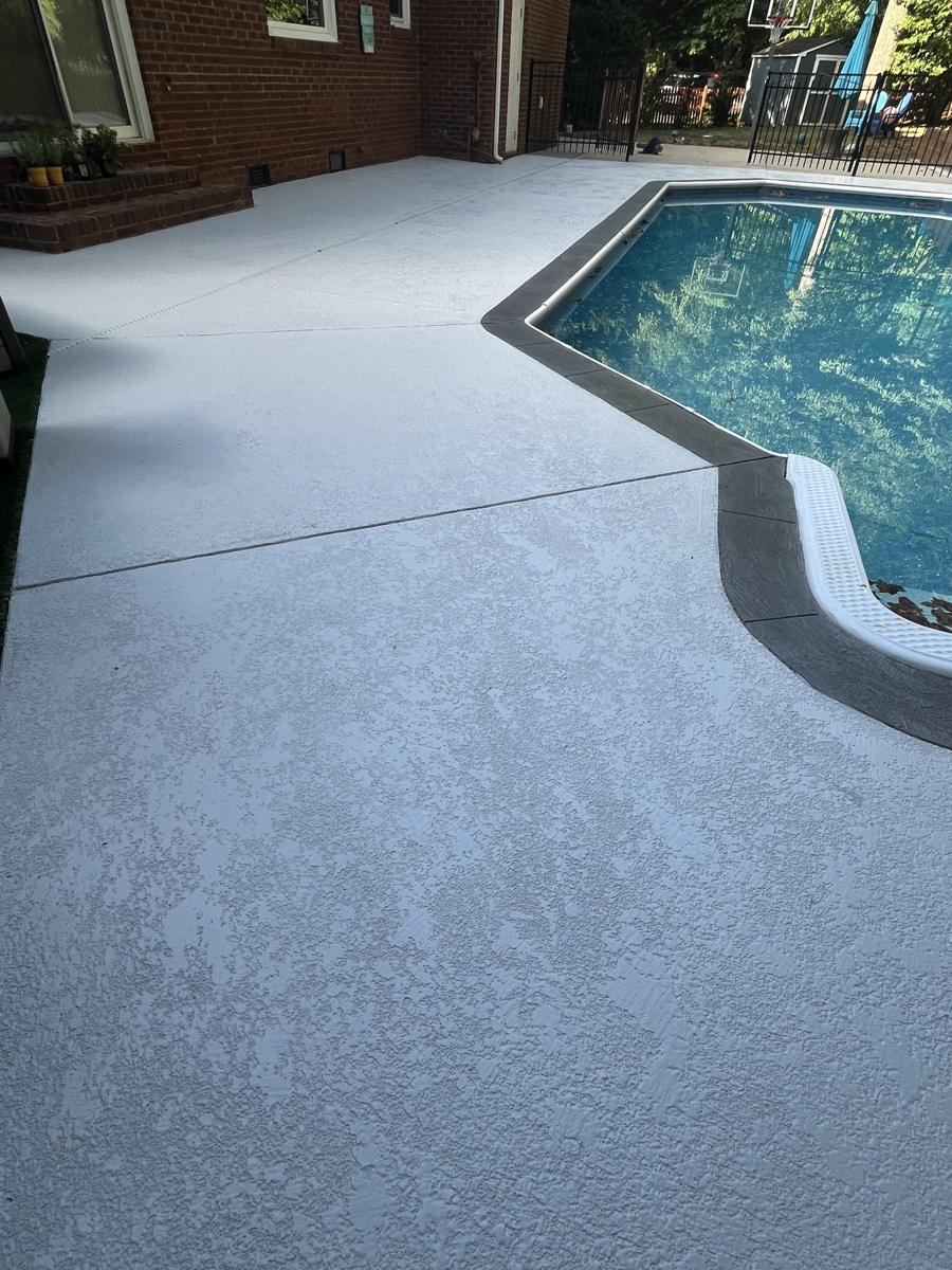 Same pool deck after knockdown overlay by Elite Surfaces